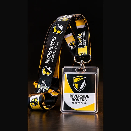 Illustrative Riverside Rovers Custom Printed Lanyards with a black, gold and white club shield