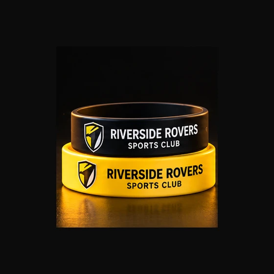 Illustrative Riverside Rovers Custom Silicone Wristbands with a black, gold and white club shield